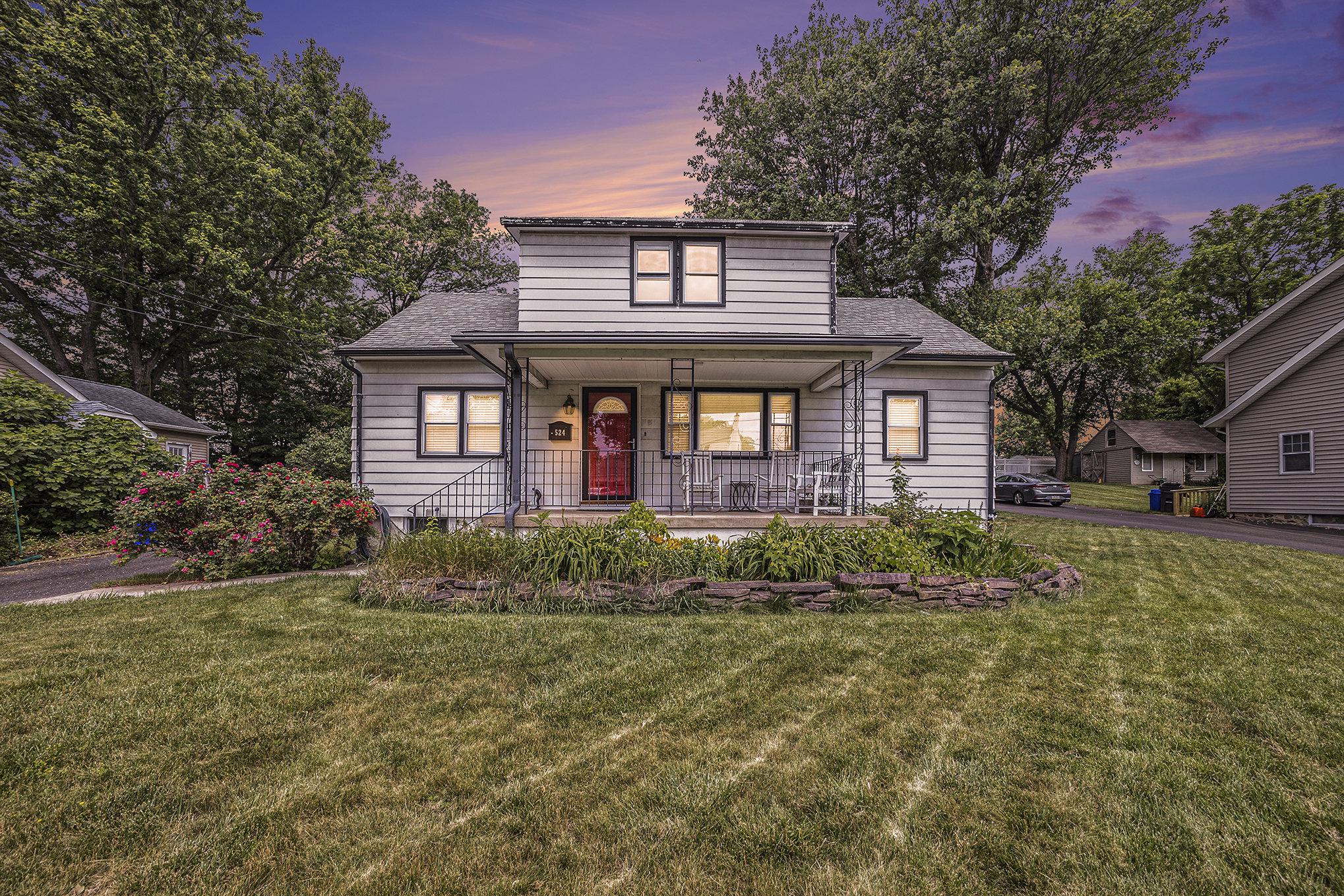 Charming home with vibrant sunset glow.
