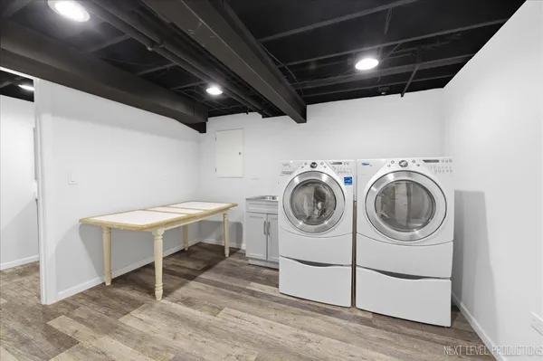 a utility room with dryer and washer