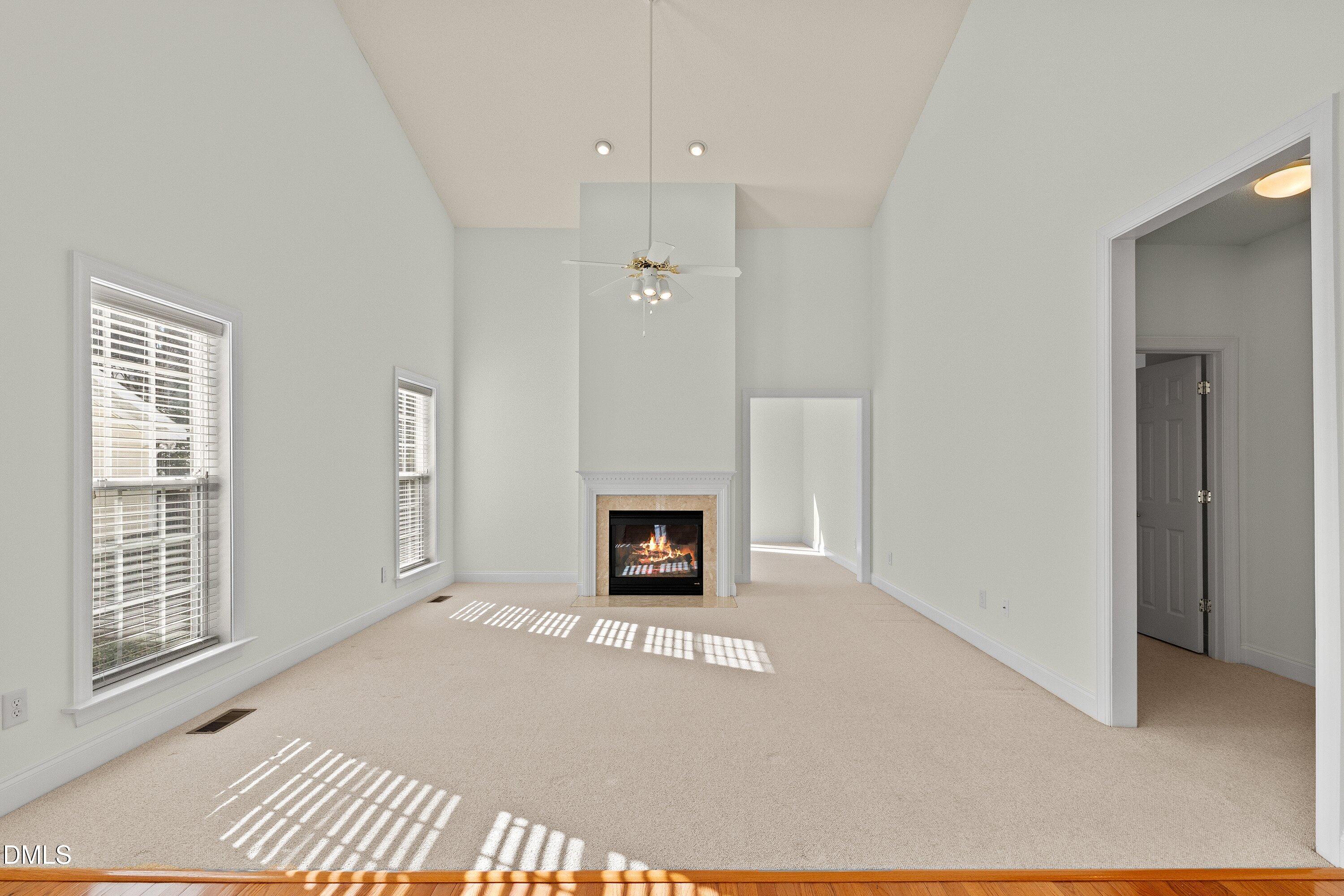 105 Rockport Ridge Way Cary, NC 27519 - Photo 16 of 43 a view of a livingroom with a fireplace and window