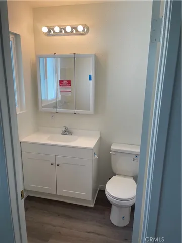 a bathroom with a shower and a toilet