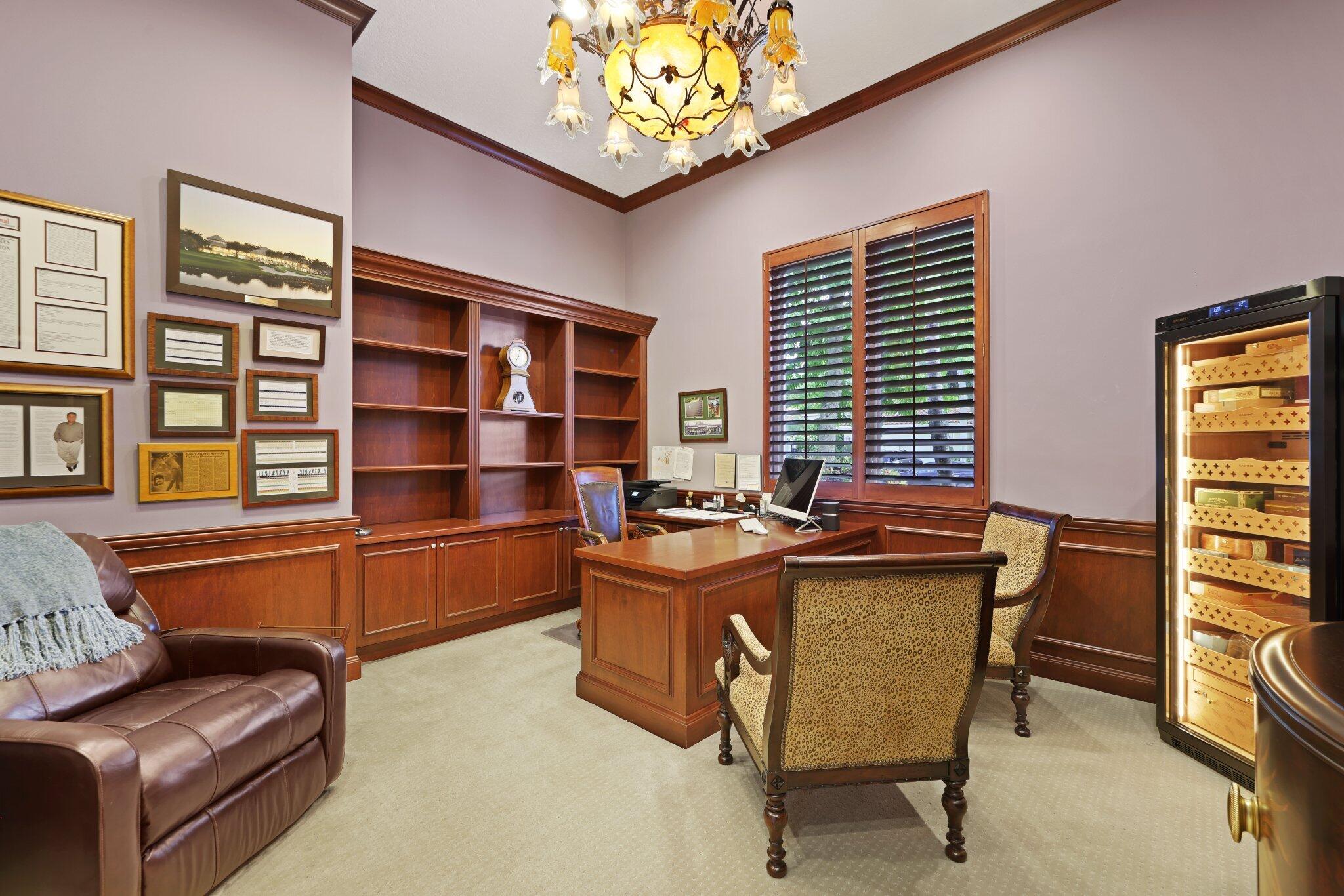 7039 Mandarin Drive Boca Raton, FL 33433 - Photo 24 of 52 a view of a workspace with furniture and a window