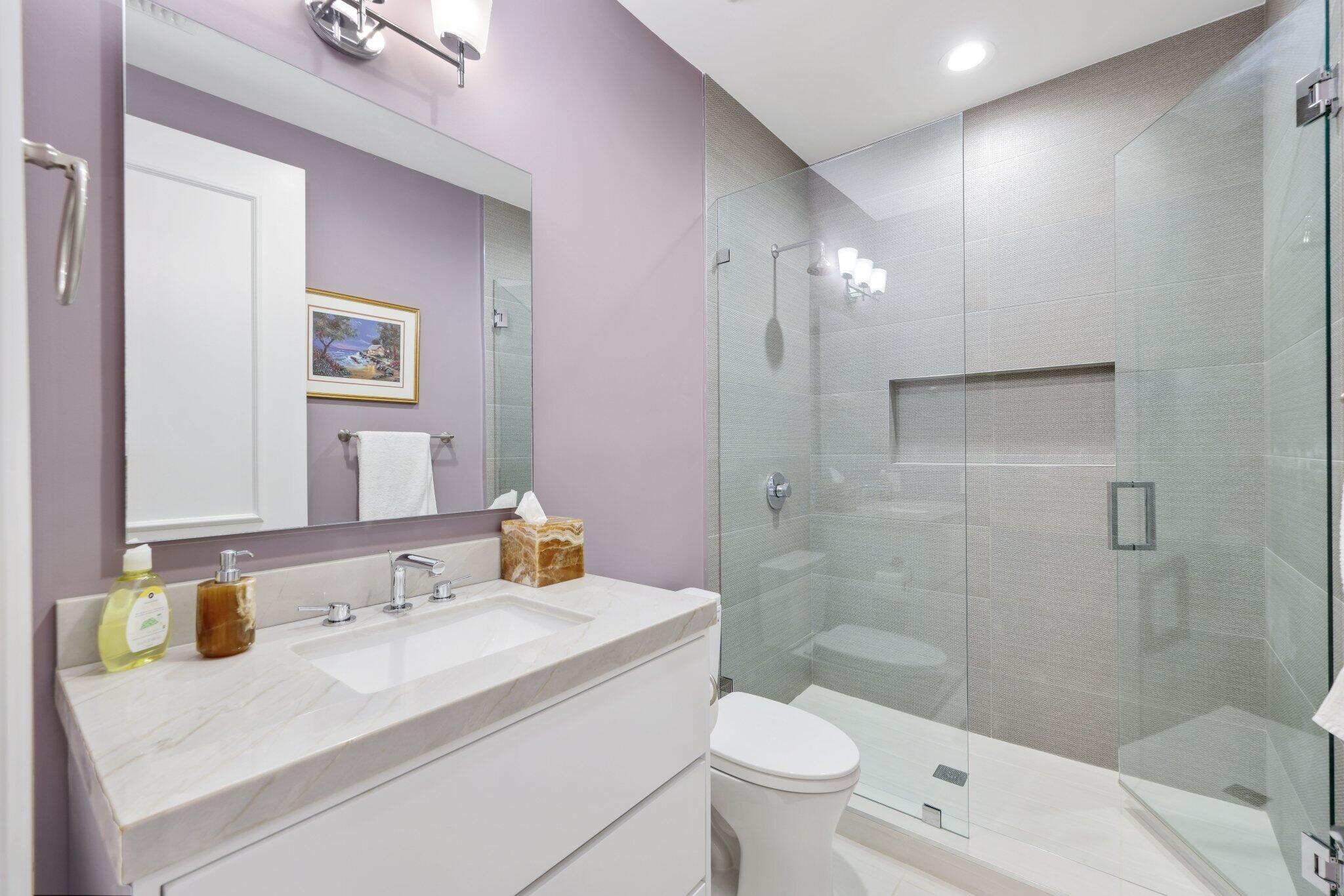 7039 Mandarin Drive Boca Raton, FL 33433 - Photo 25 of 52 a bathroom with a sink toilet and shower
