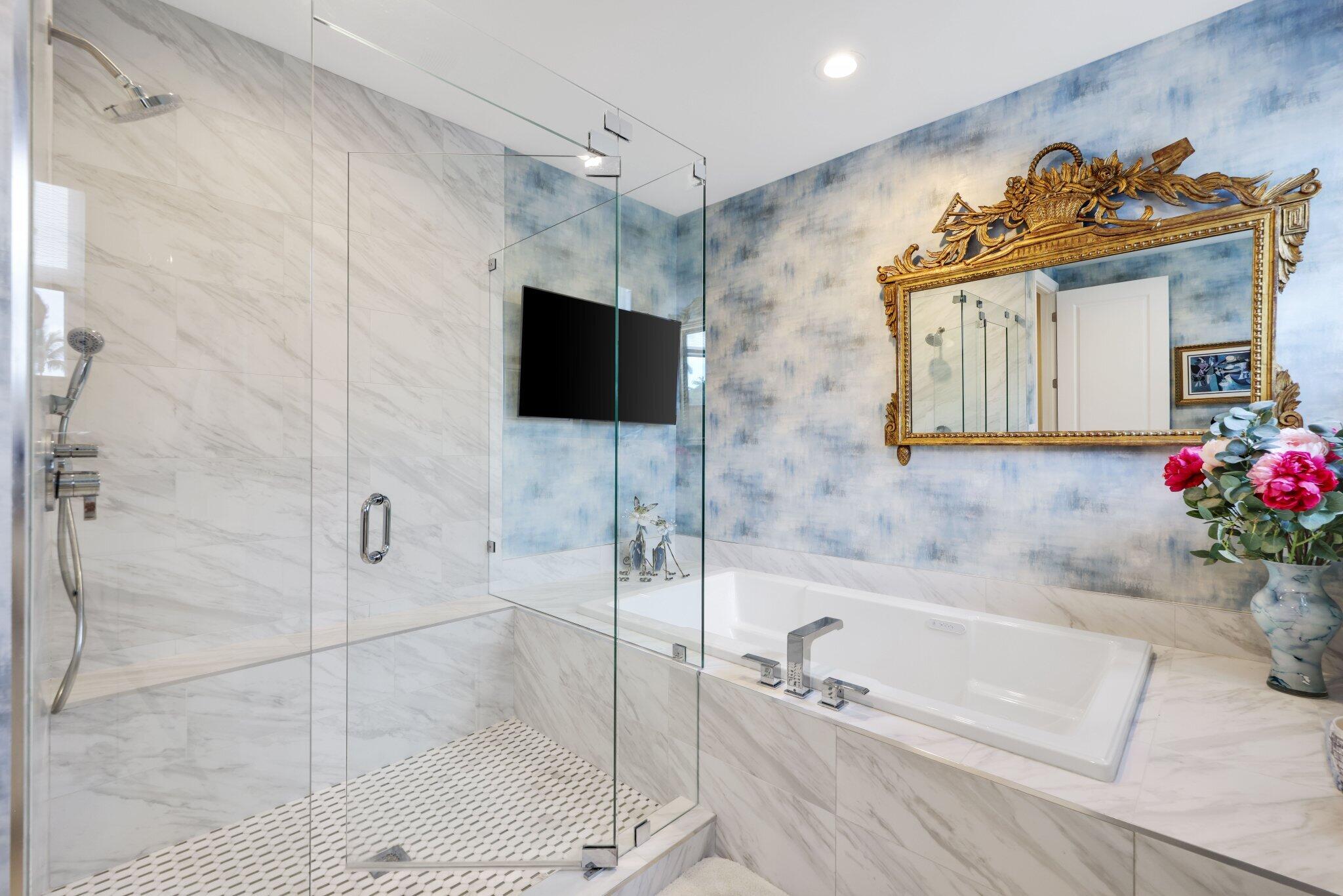 7039 Mandarin Drive Boca Raton, FL 33433 - Photo 35 of 52 a bathroom with a bathtub and a shower