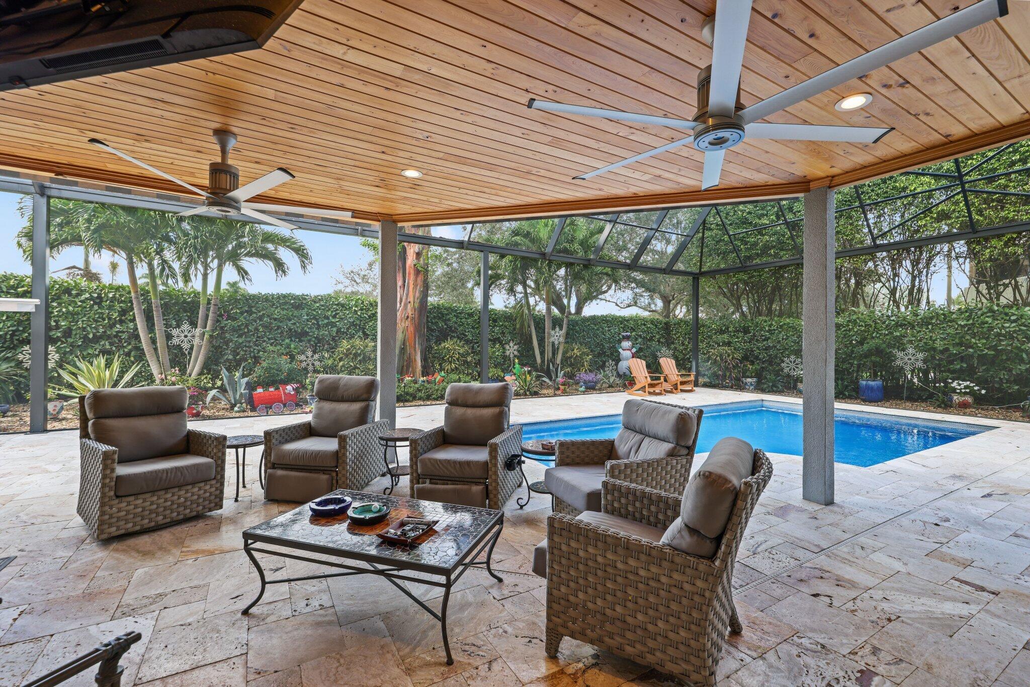 7039 Mandarin Drive Boca Raton, FL 33433 - Photo 37 of 52 a outdoor space with patio the couches and chairs
