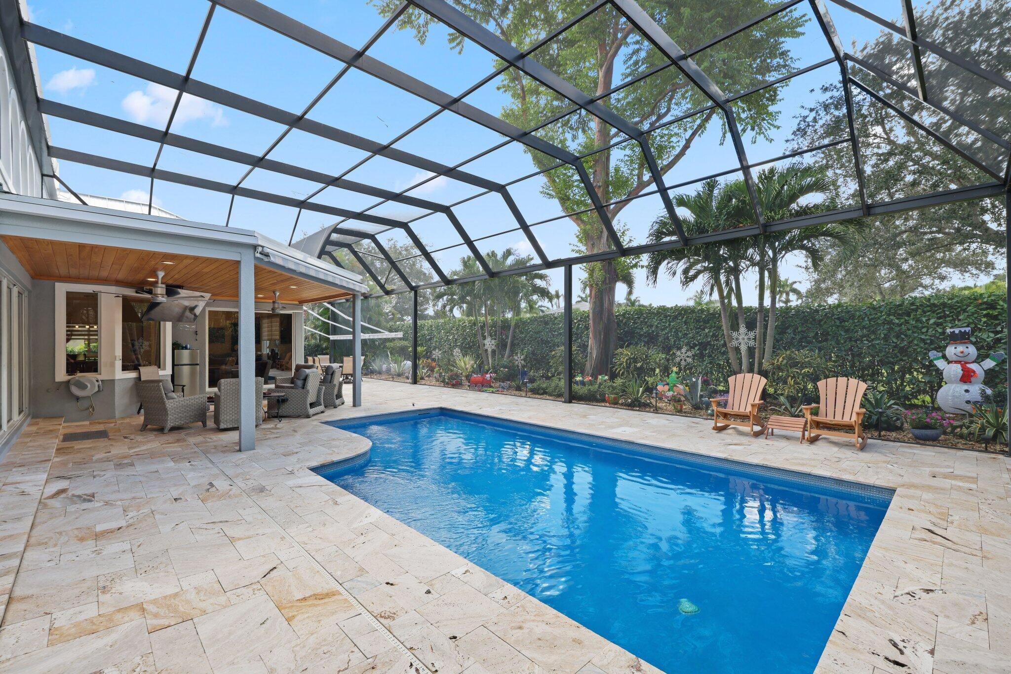 7039 Mandarin Drive Boca Raton, FL 33433 - Photo 40 of 52 a view of swimming pool with outdoor seating