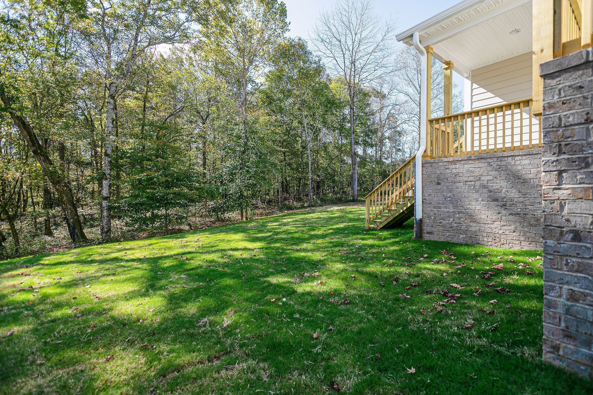 1020 Sycamore Ridge West, Unit 41 Burns, TN 37029 - Photo 29 of 60 a view of a backyard