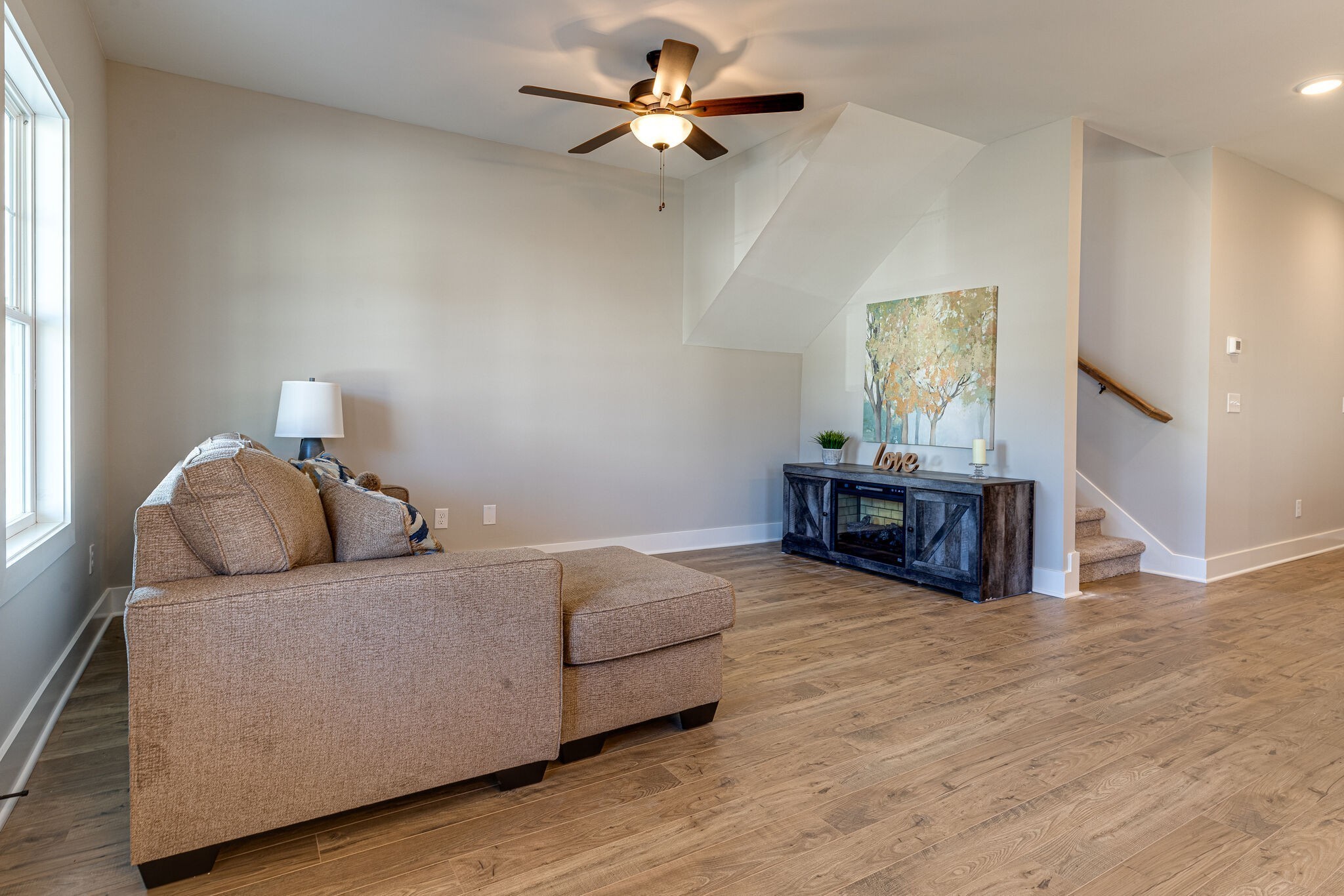 1020 Sycamore Ridge West, Unit 41 Burns, TN 37029 - Photo 35 of 60 a living room with furniture and a wooden floor