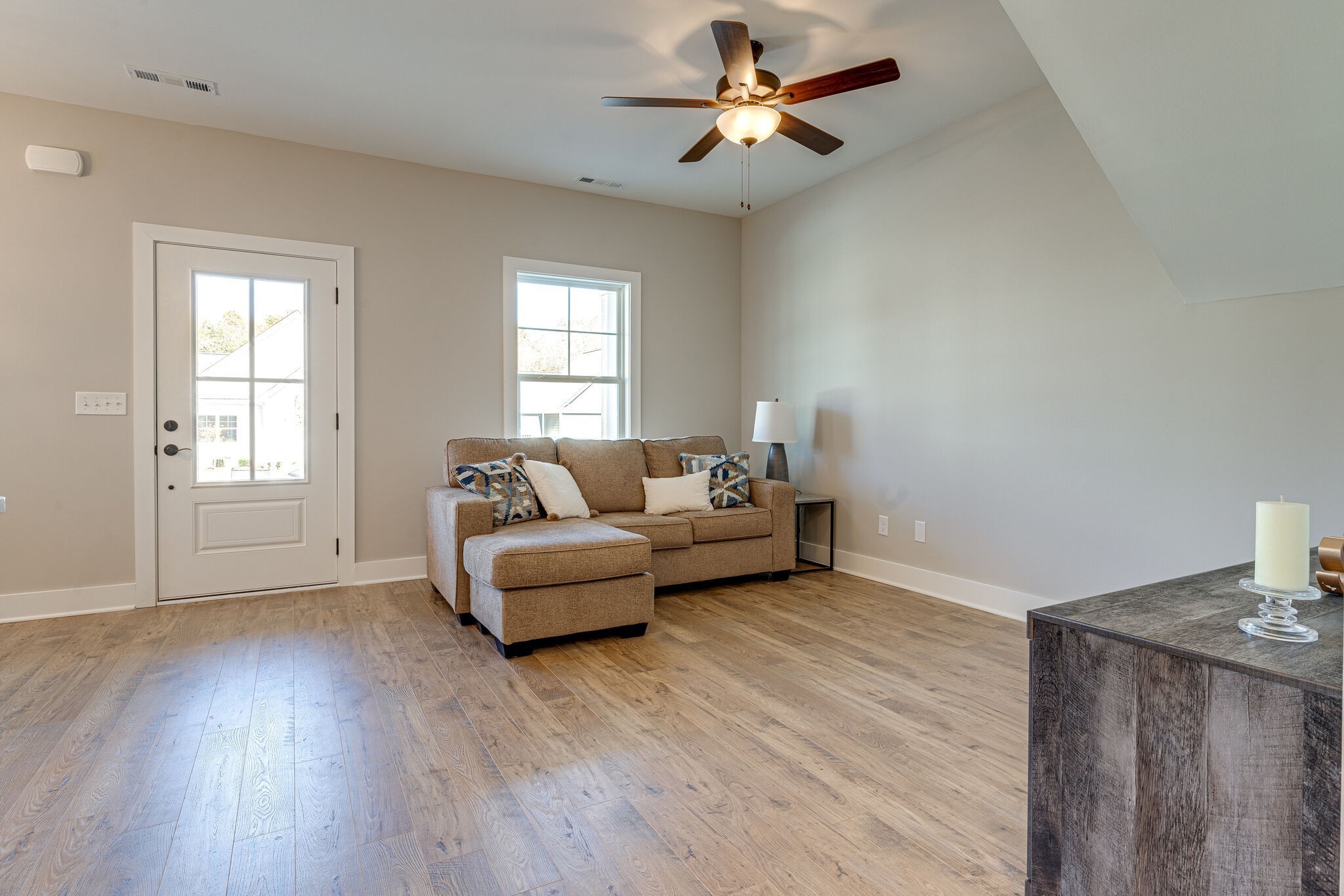 1020 Sycamore Ridge West, Unit 41 Burns, TN 37029 - Photo 36 of 60 a living room with furniture and a window