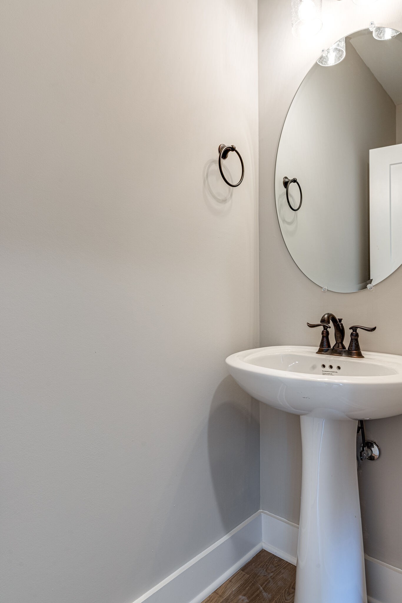 1020 Sycamore Ridge West, Unit 41 Burns, TN 37029 - Photo 42 of 60 a bathroom with a sink and mirror