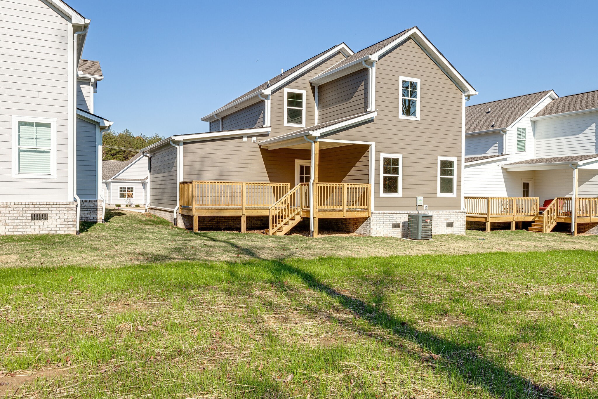 1020 Sycamore Ridge West, Unit 41 Burns, TN 37029 - Photo 60 of 60 a front view of a house with a yard