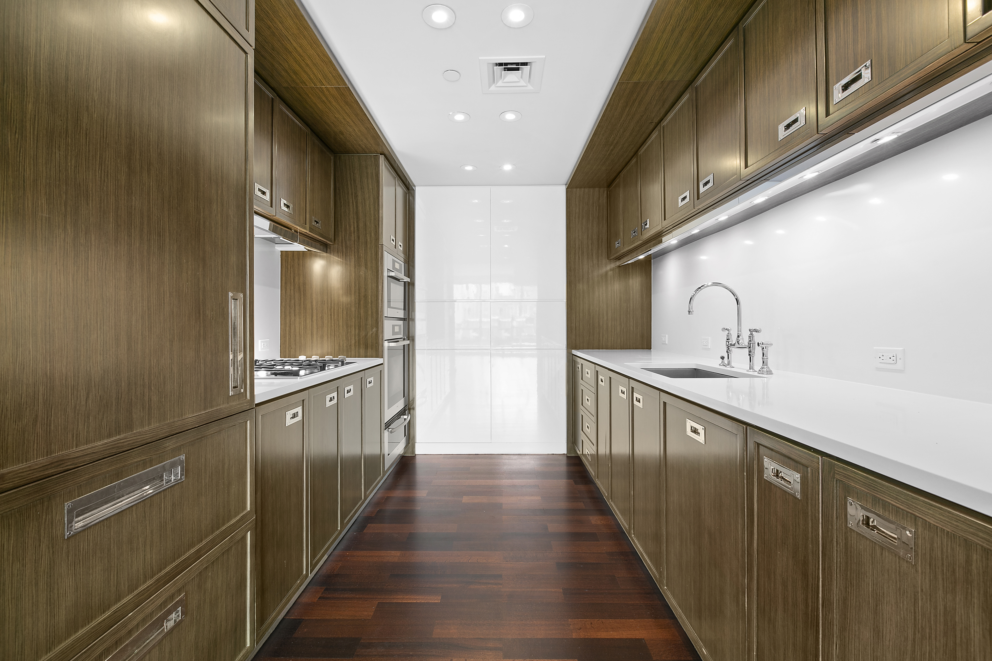 151 East 85th Street, Unit 6B Manhattan, NY 10028 - Photo 6 of 10 a view of a hallway with wooden floor