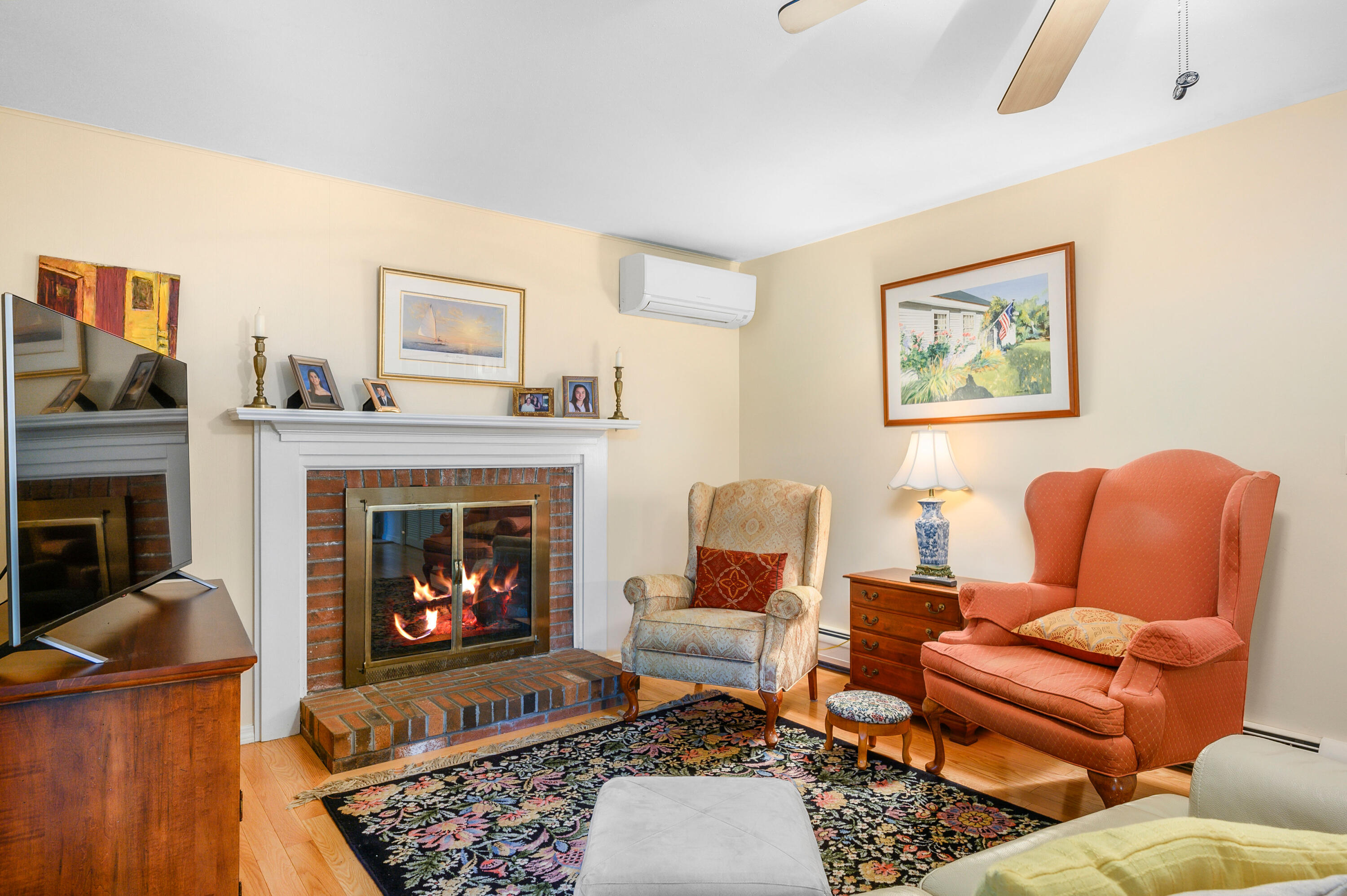 167 James Otis Road Centerville, MA 02632 - Photo 14 of 36 a living room with furniture and a fireplace