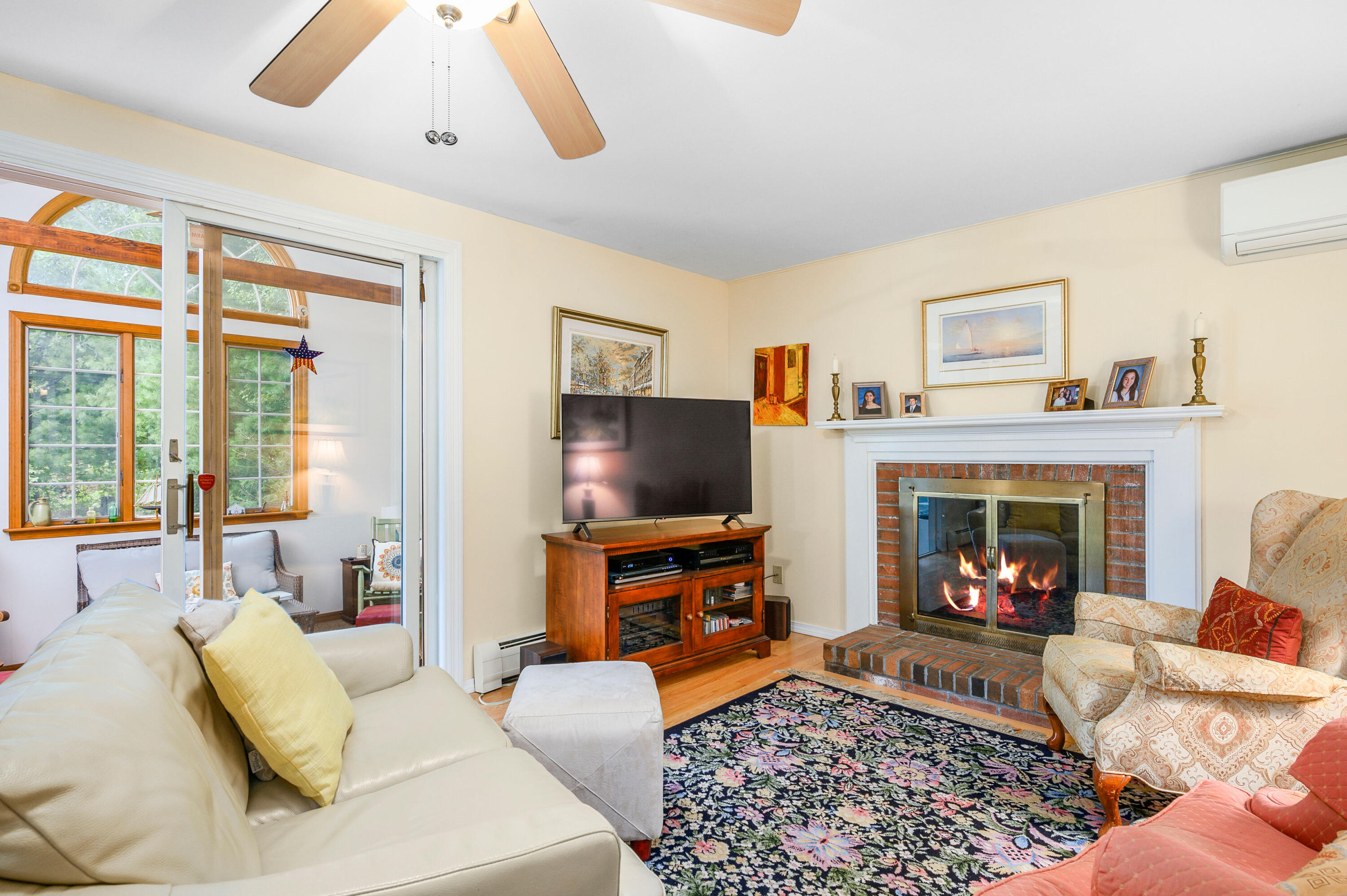167 James Otis Road Centerville, MA 02632 - Photo 15 of 36 a living room with furniture and a fireplace