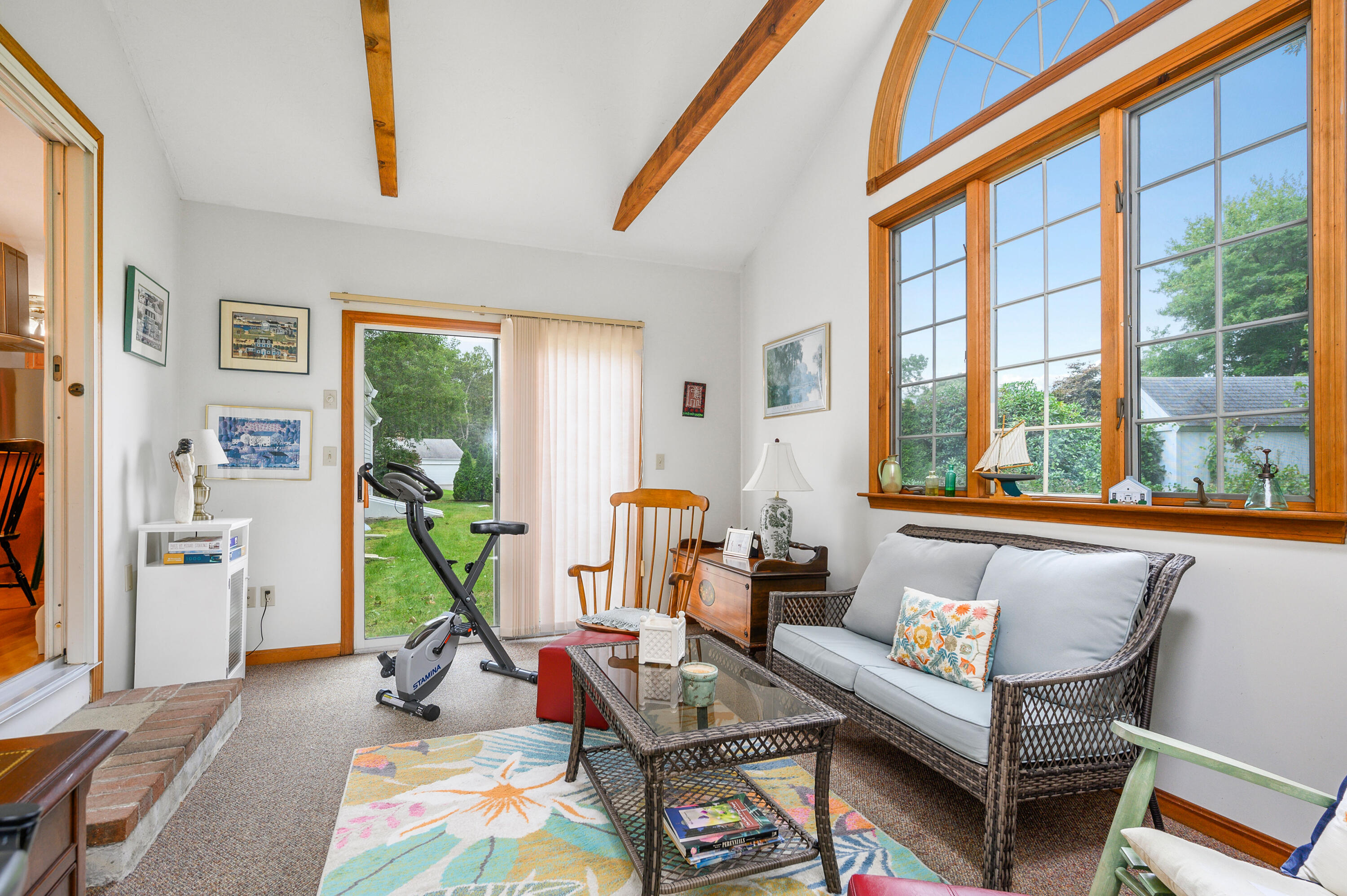 167 James Otis Road Centerville, MA 02632 - Photo 19 of 36 a living room with furniture and a floor to ceiling window
