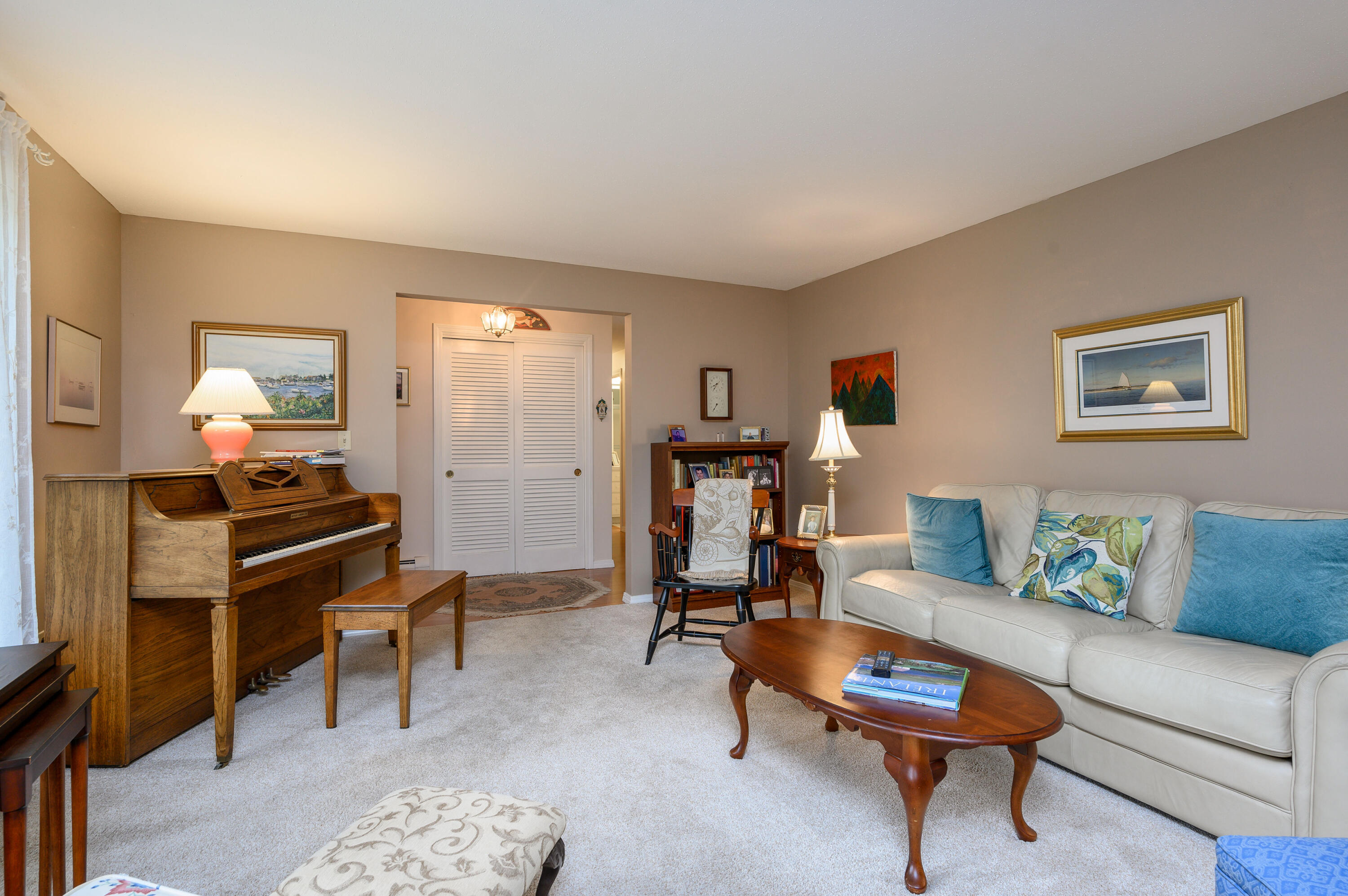 167 James Otis Road Centerville, MA 02632 - Photo 21 of 36 a living room with furniture a piano and a window