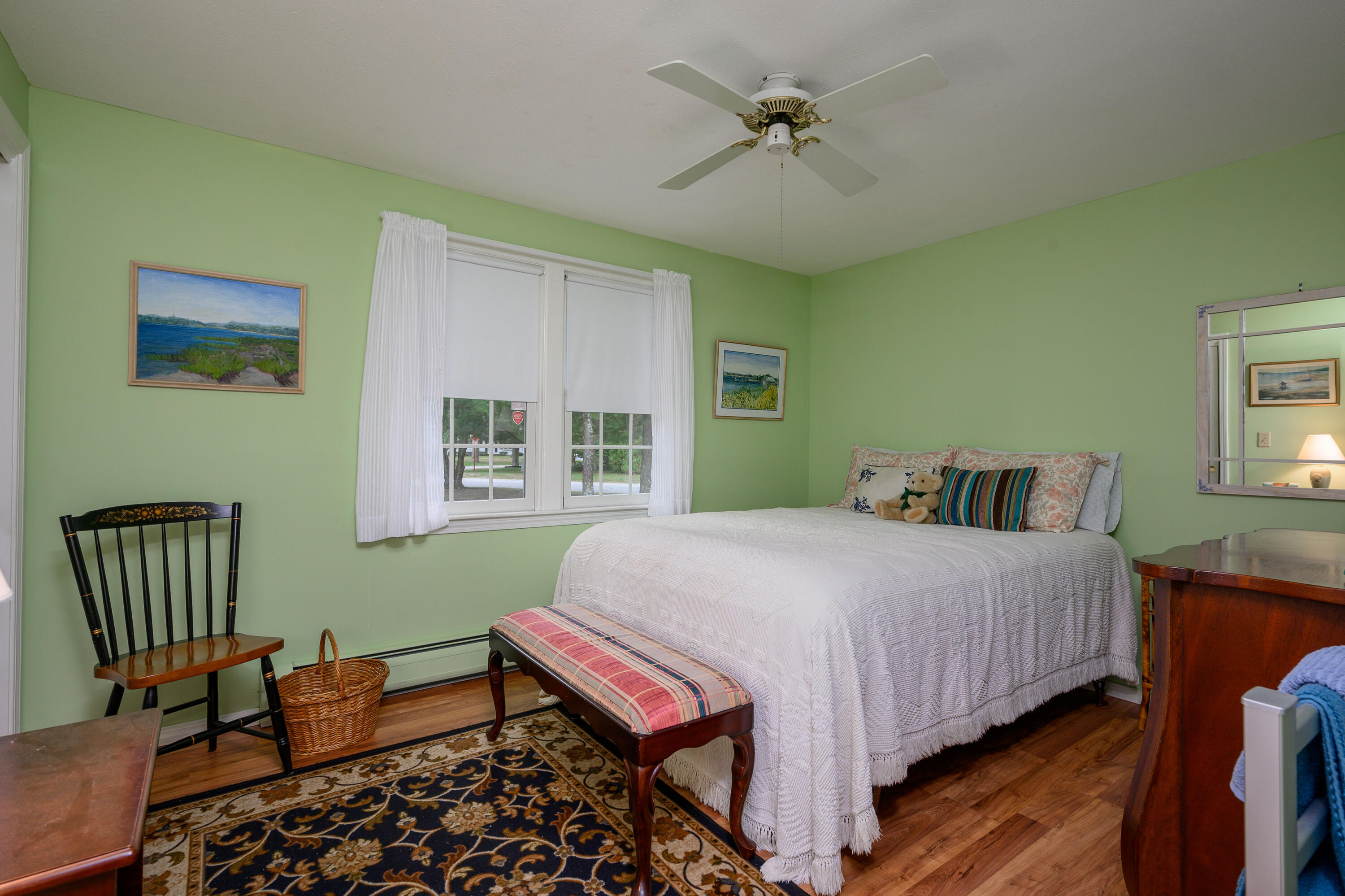 167 James Otis Road Centerville, MA 02632 - Photo 31 of 36 a bedroom with a bed chairs and a window