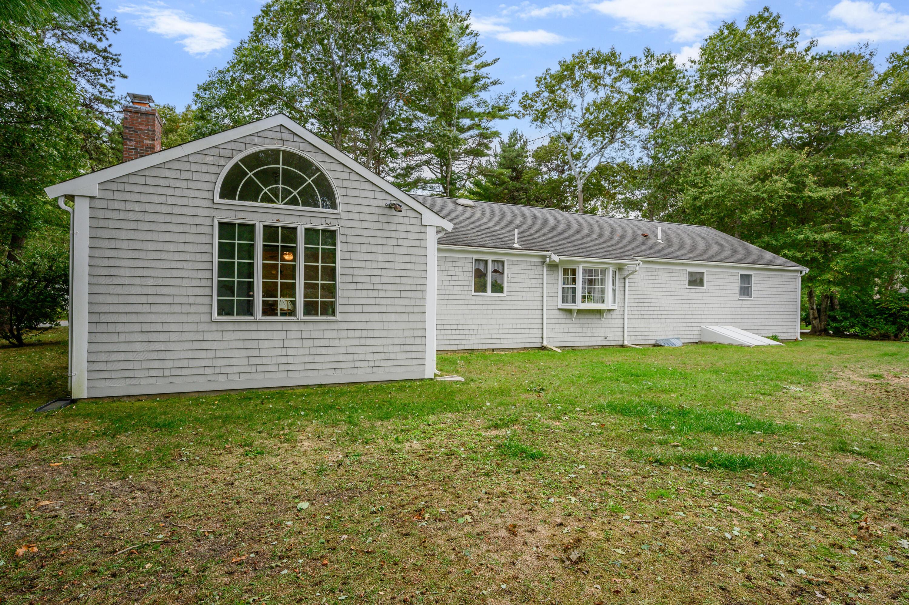 167 James Otis Road Centerville, MA 02632 - Photo 6 of 36 a view of a backyard of the house