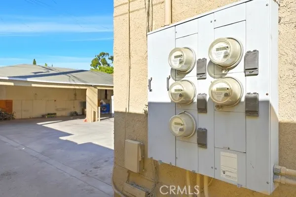 a clock on a wall next to a sink
