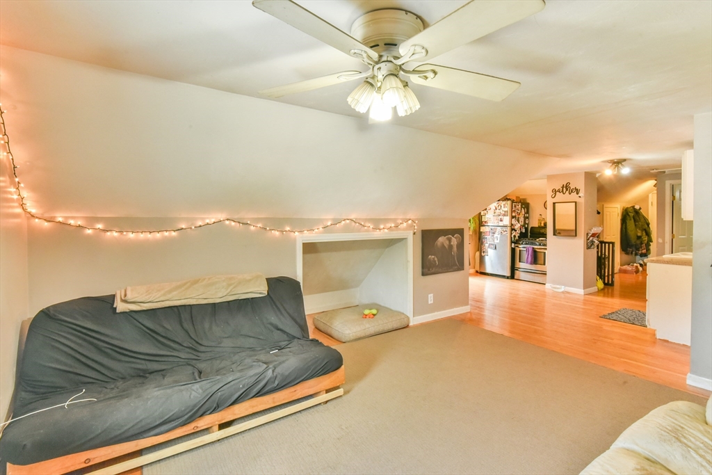 4 Agate Avenue Worcester, MA 01604 - Photo 33 of 39 a view of a living room and chandelier