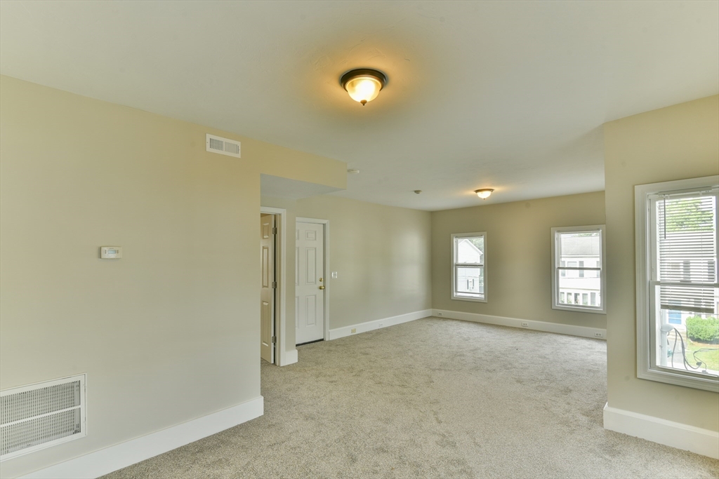 4 Agate Avenue Worcester, MA 01604 - Photo 9 of 39 a view of livingroom with windows