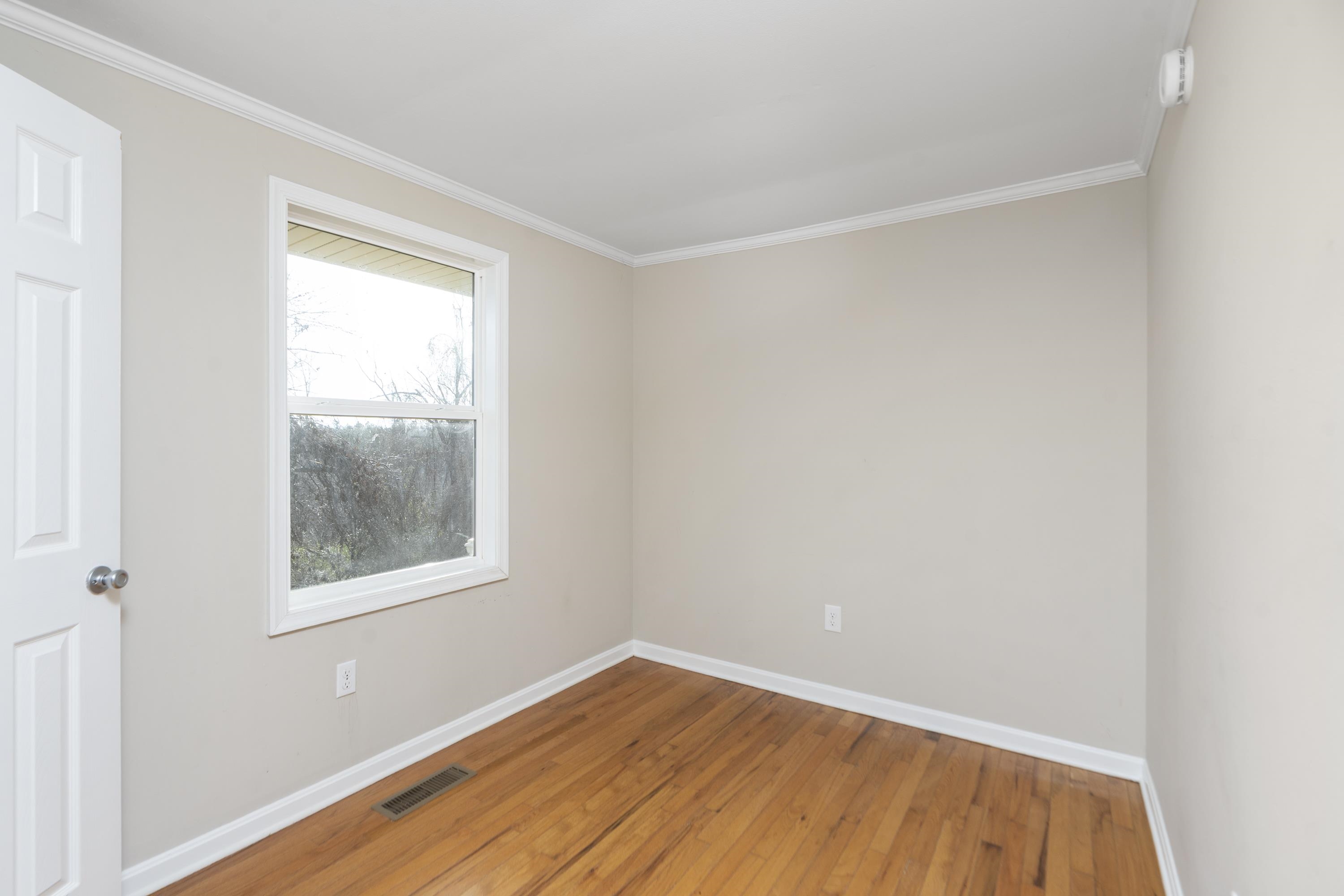 7081 Secretarys Sand Road Schuyler, VA 22969 - Photo 17 of 65 an empty room with a window