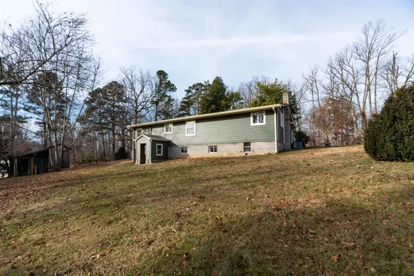 a view of a house with a big yard