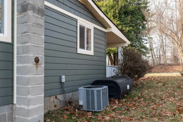 a house with trees in front of it