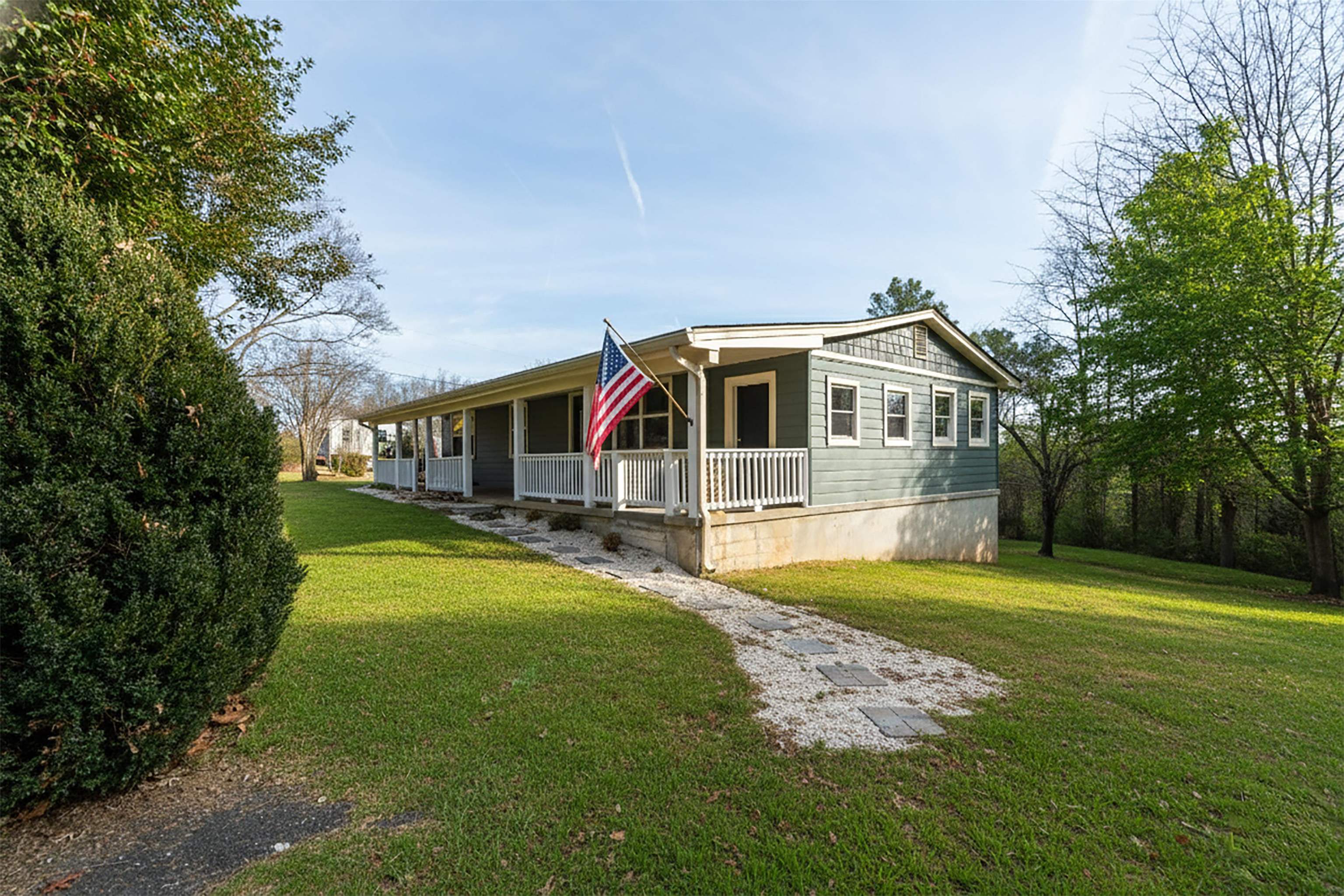 7081 Secretarys Sand Road Schuyler, VA 22969 - Photo 4 of 65 a front view of a house with a big yard