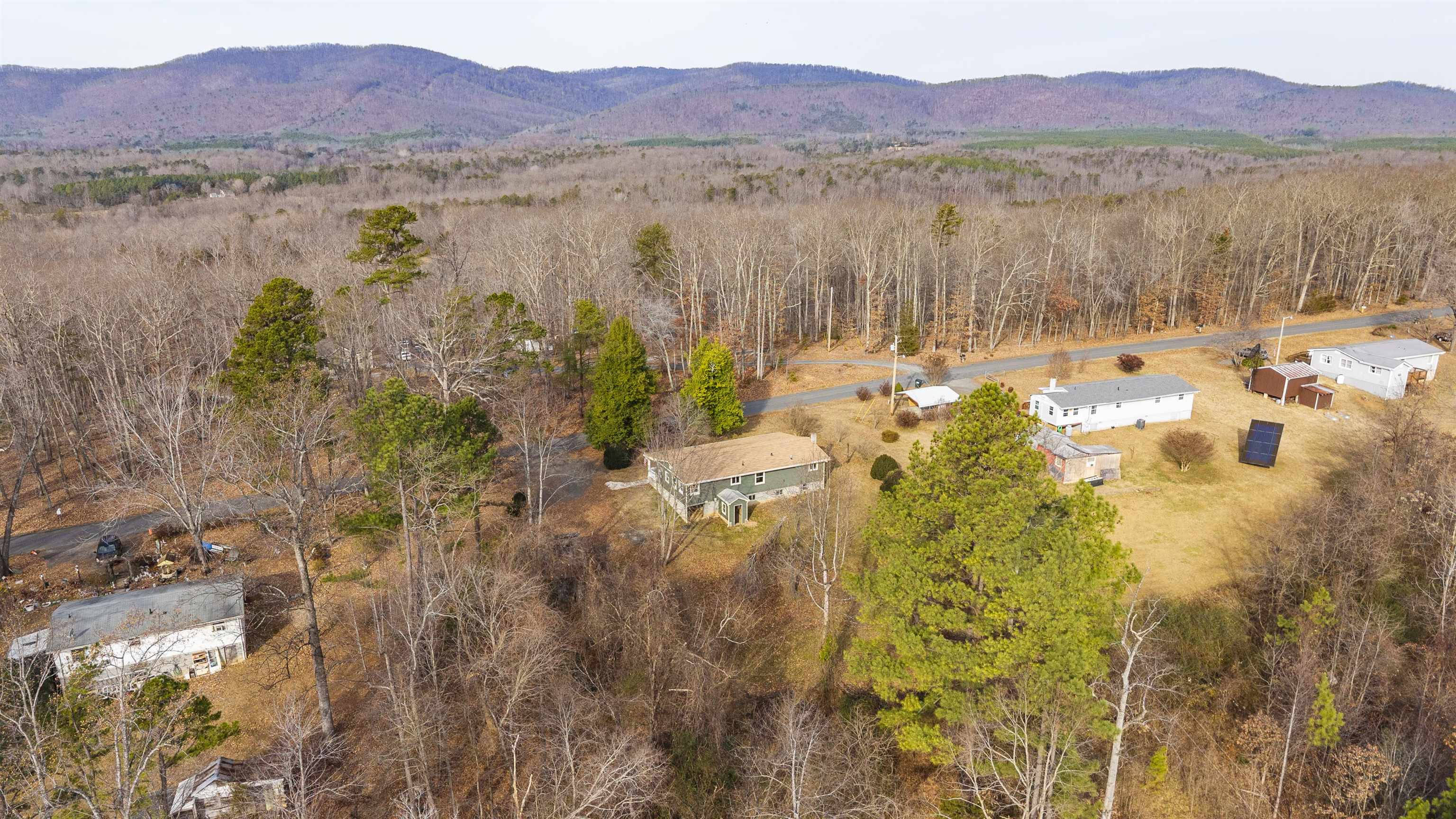 7081 Secretarys Sand Road Schuyler, VA 22969 - Photo 42 of 64 a view of lake with mountain in the background