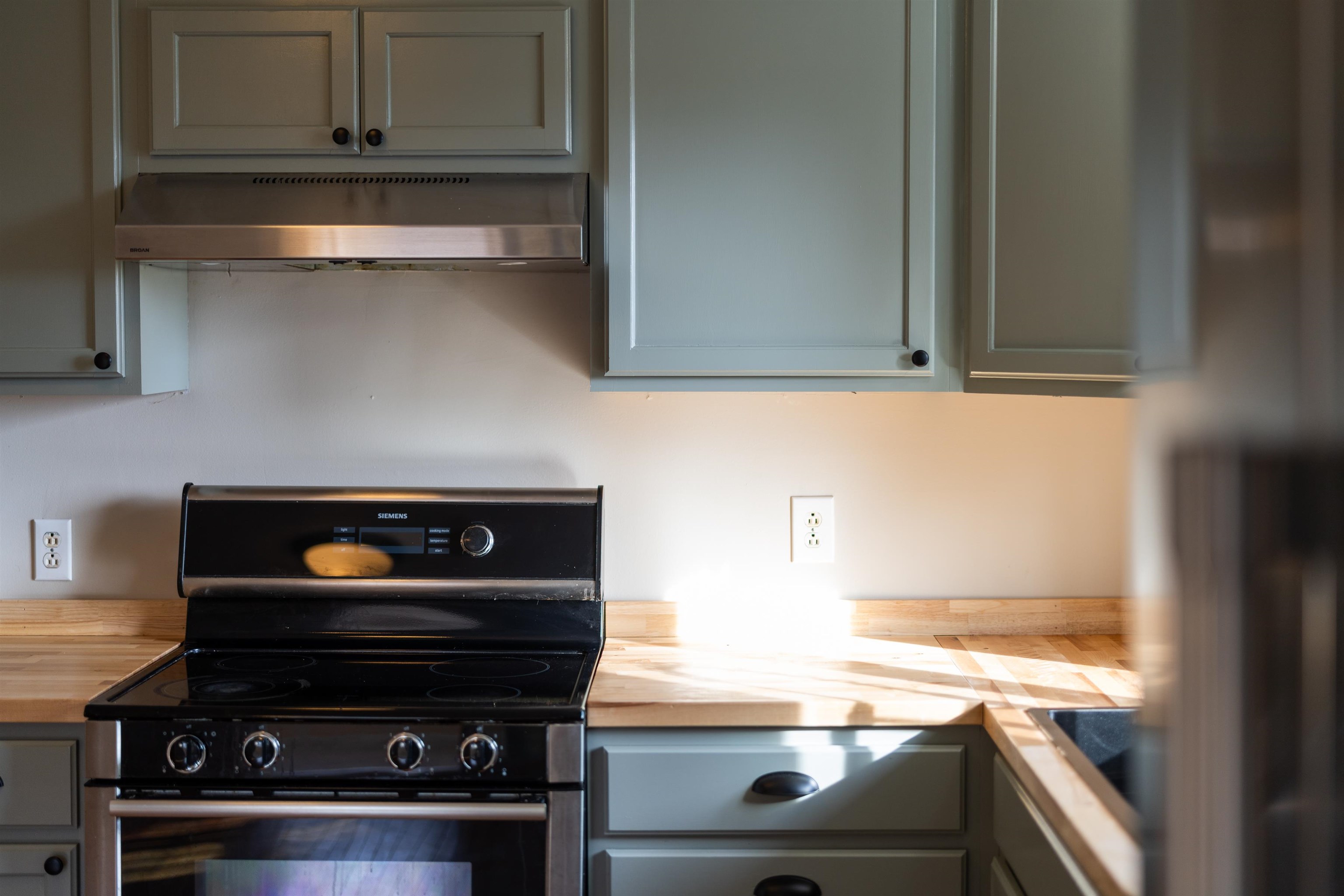 7081 Secretarys Sand Road Schuyler, VA 22969 - Photo 55 of 65 a kitchen with a stove and a microwave