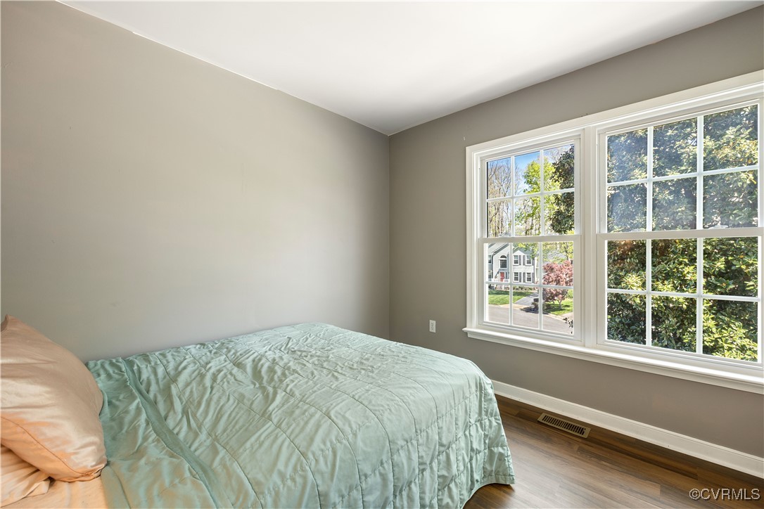 15221 Windy Ridge Road Midlothian, VA 23112 - Photo 11 of 30 a bedroom with a bed and a window