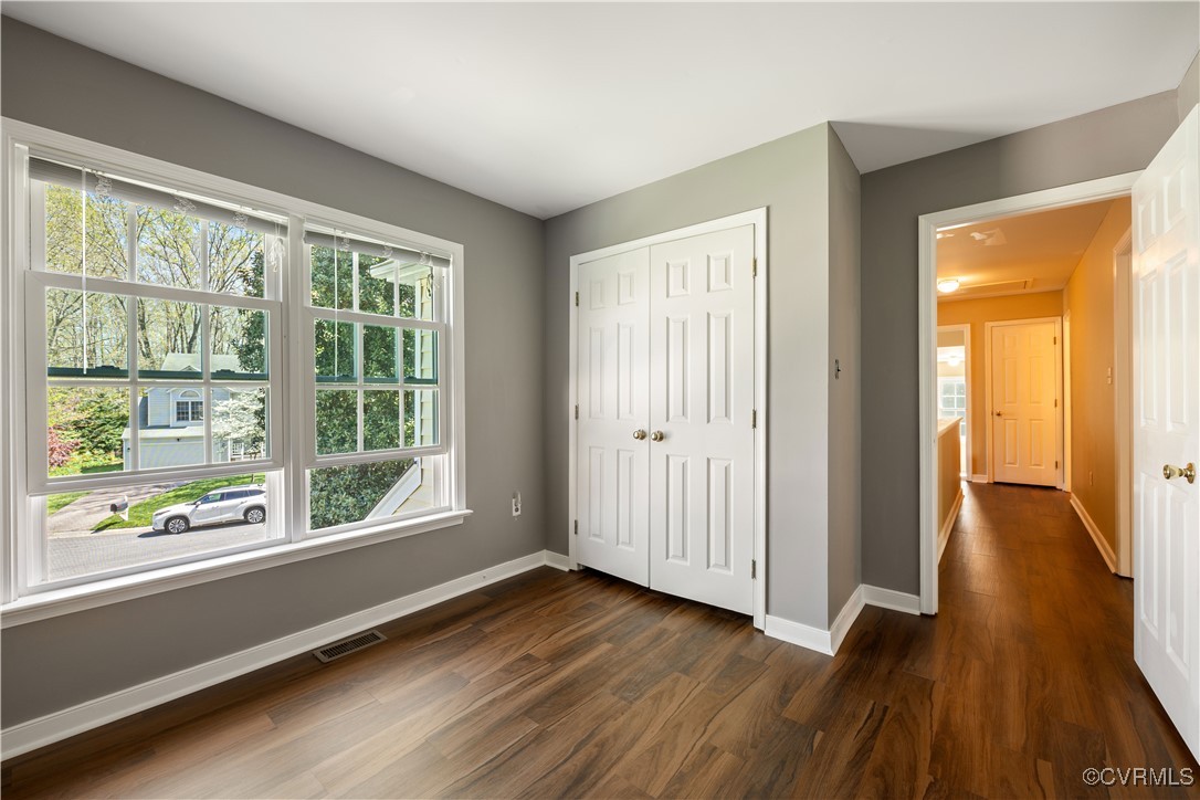 15221 Windy Ridge Road Midlothian, VA 23112 - Photo 18 of 30 wooden floor in an empty room with a window