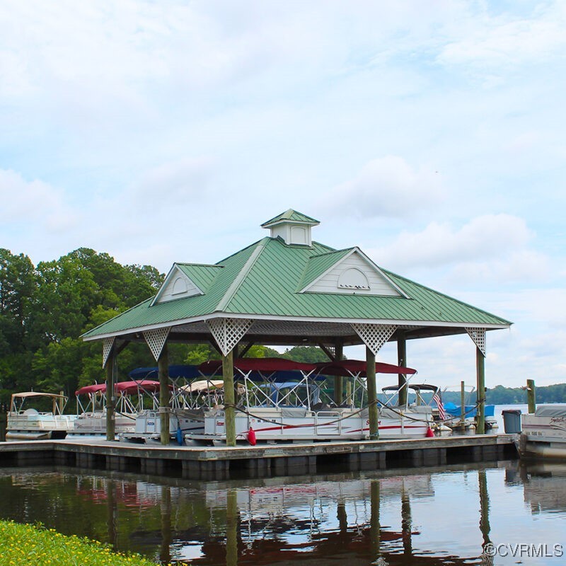 15221 Windy Ridge Road Midlothian, VA 23112 - Photo 29 of 30 a view of house with swimming pool and outdoor seating