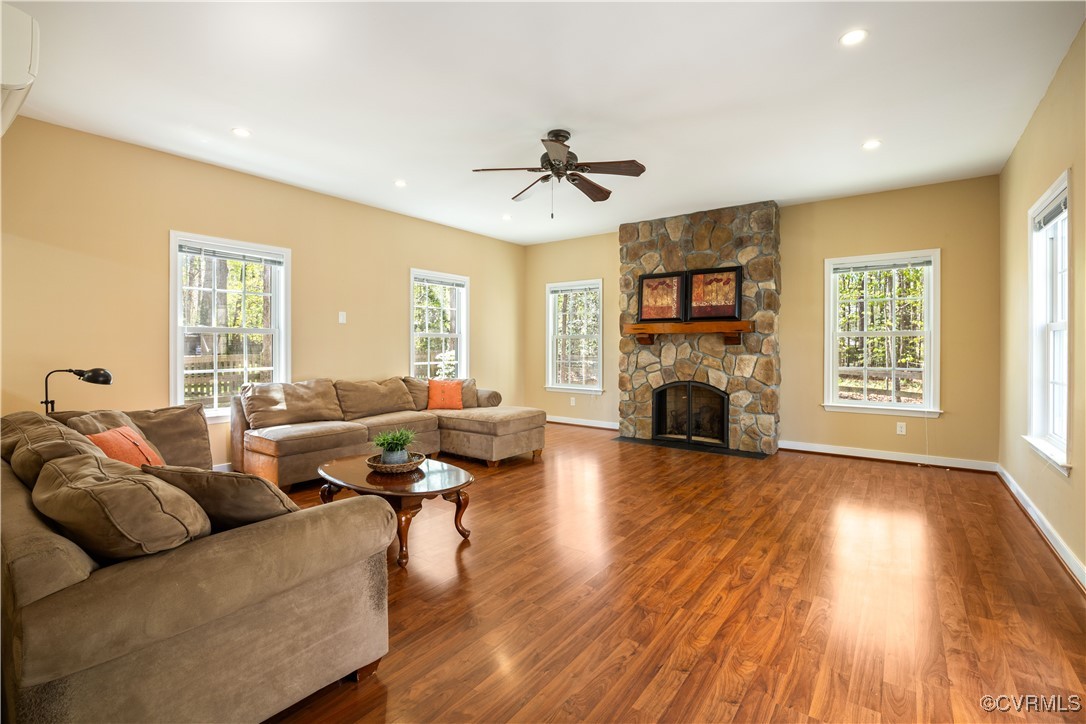15221 Windy Ridge Road Midlothian, VA 23112 - Photo 9 of 30 a living room with fireplace furniture and a fireplace