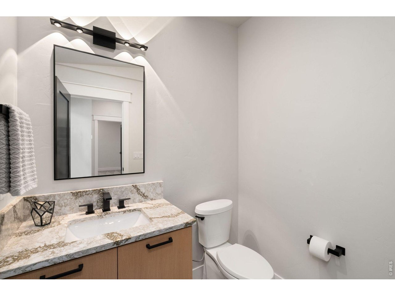 2311 Sugarloaf Road Berthoud, CO 80513 - Photo 32 of 49 a bathroom with a sink and a toilet