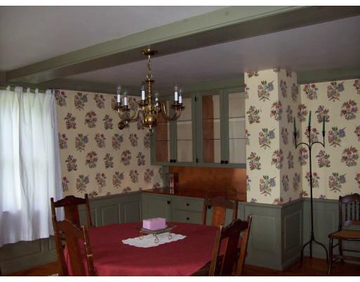 8 Charlemont Road Buckland, MA 01338 - Photo 6 of 10 a table and chairs in a glass room