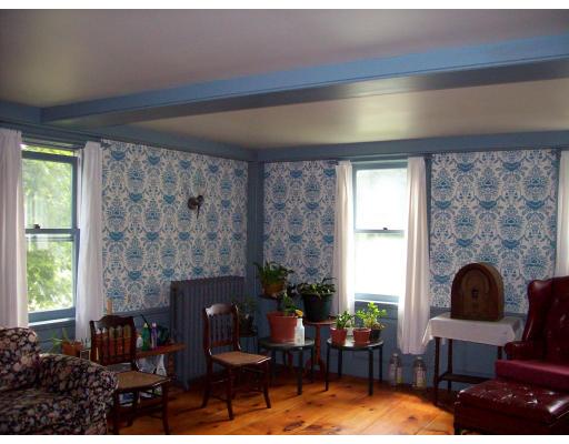 8 Charlemont Road Buckland, MA 01338 - Photo 7 of 10 a living room with furniture and a fireplace