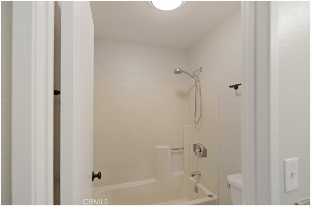 18 Corniche Drive, Unit E Dana Point, CA 92629 - Photo 16 of 38 a bathroom with a shower