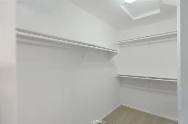 a view of an empty walk in closet