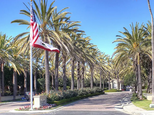 a view of a palm trees front of a building