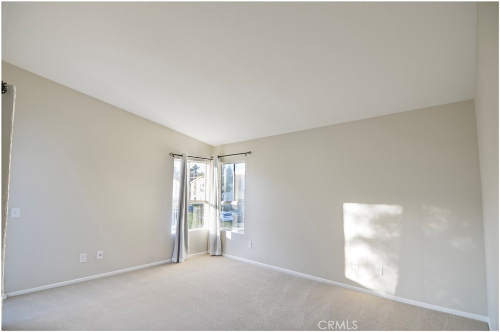 18 Corniche Drive, Unit E Dana Point, CA 92629 - Photo 5 of 38 a big room with windows and closet