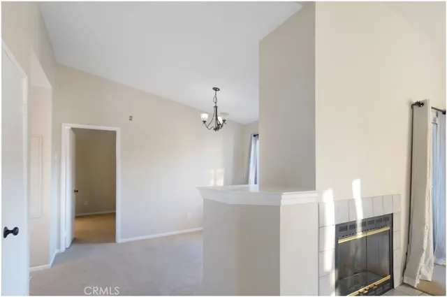 a view of a hallway with windows