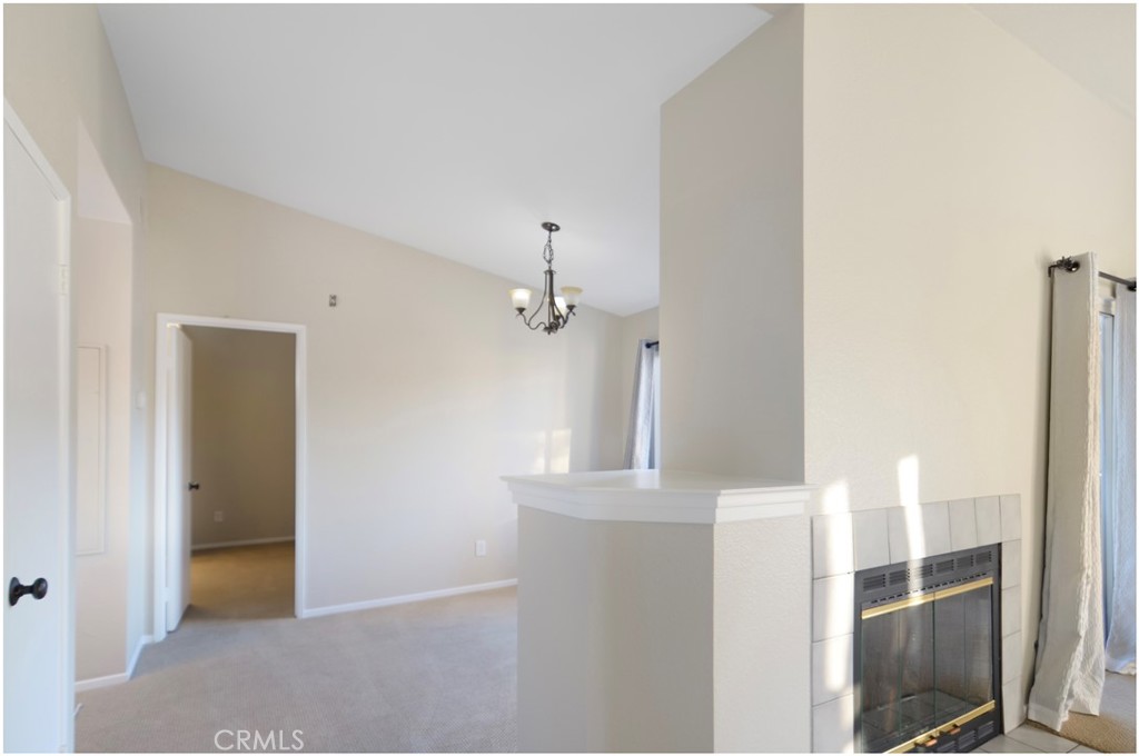 18 Corniche Drive, Unit E Dana Point, CA 92629 - Photo 9 of 38 a view of a hallway with windows