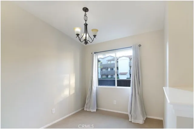 a view of a room with a large window