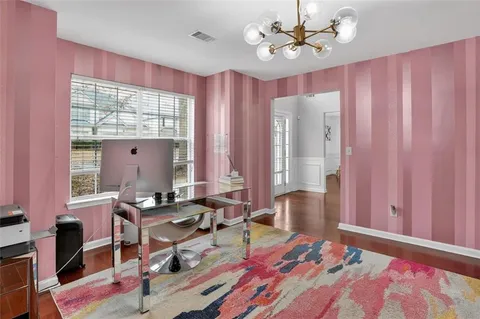 a room with furniture and a window