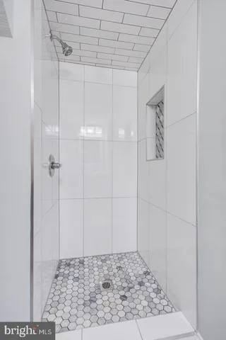 a kitchen with a refrigerator a sink and a refrigerator