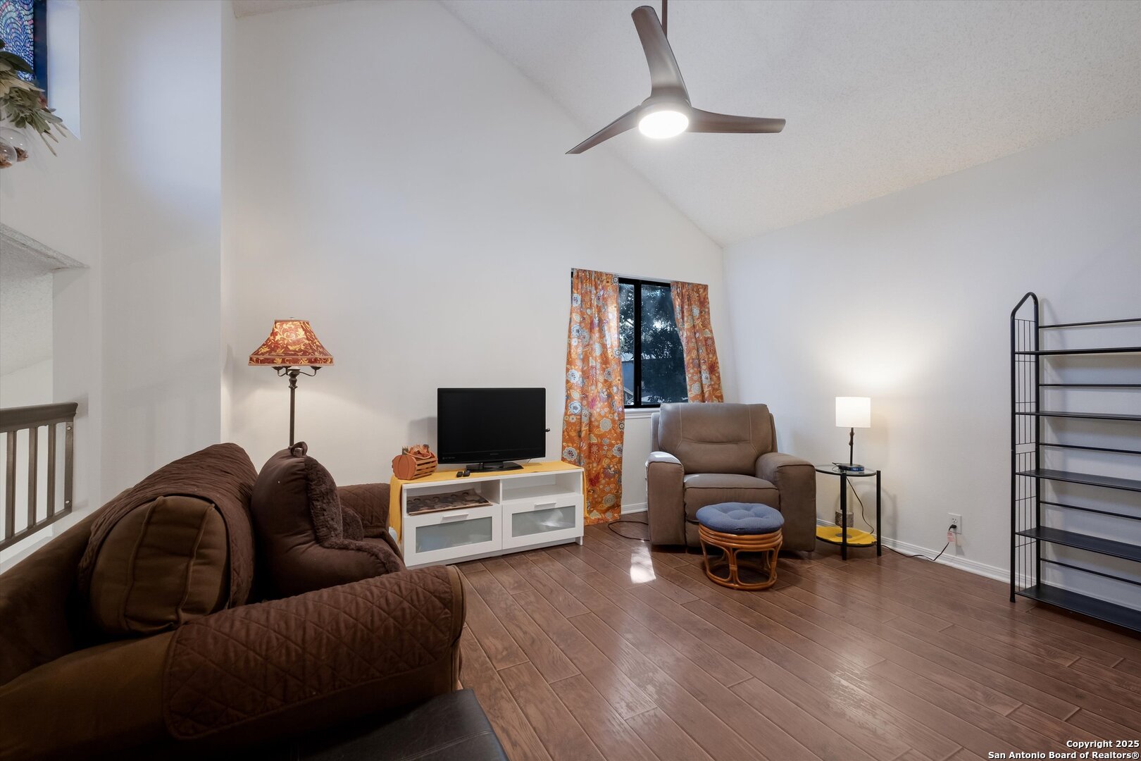 5738 Spring Sunshine San Antonio, TX 78247 - Photo 18 of 22 a living room with furniture and a flat screen tv