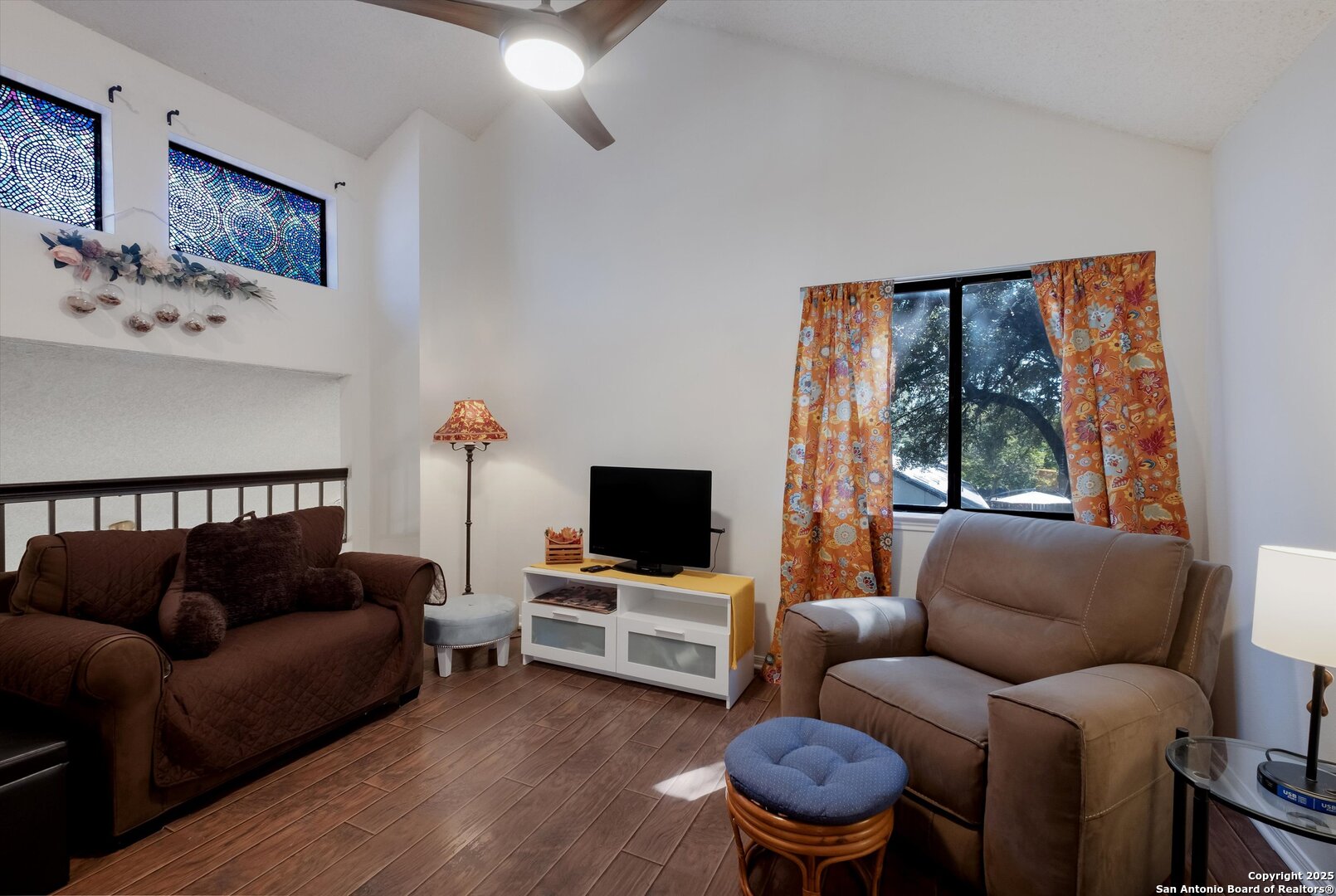 5738 Spring Sunshine San Antonio, TX 78247 - Photo 19 of 22 a living room with furniture and a flat screen tv