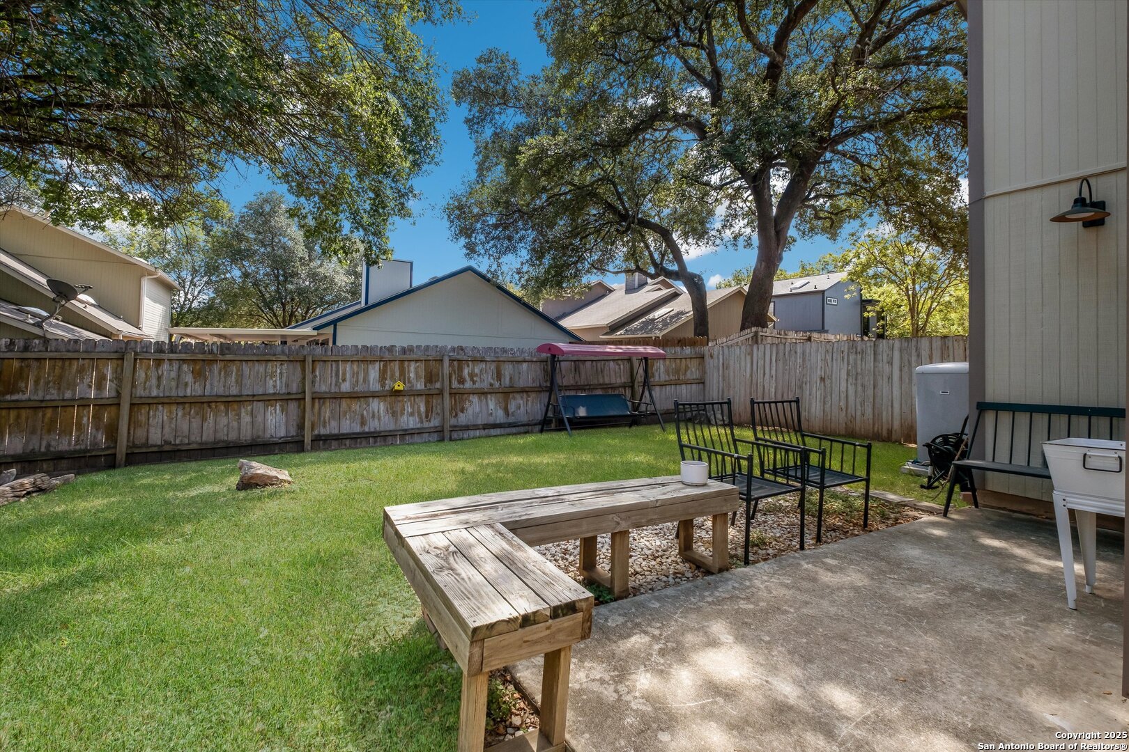 5738 Spring Sunshine San Antonio, TX 78247 - Photo 20 of 22 a view of house with backyard and a slide