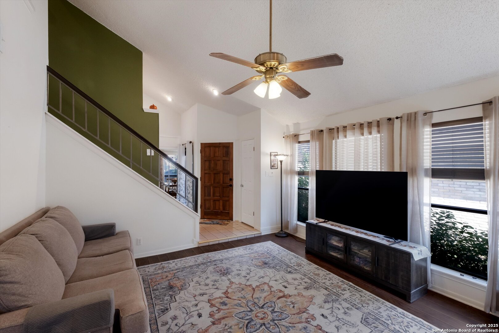5738 Spring Sunshine San Antonio, TX 78247 - Photo 5 of 22 a living room with furniture and a flat screen tv